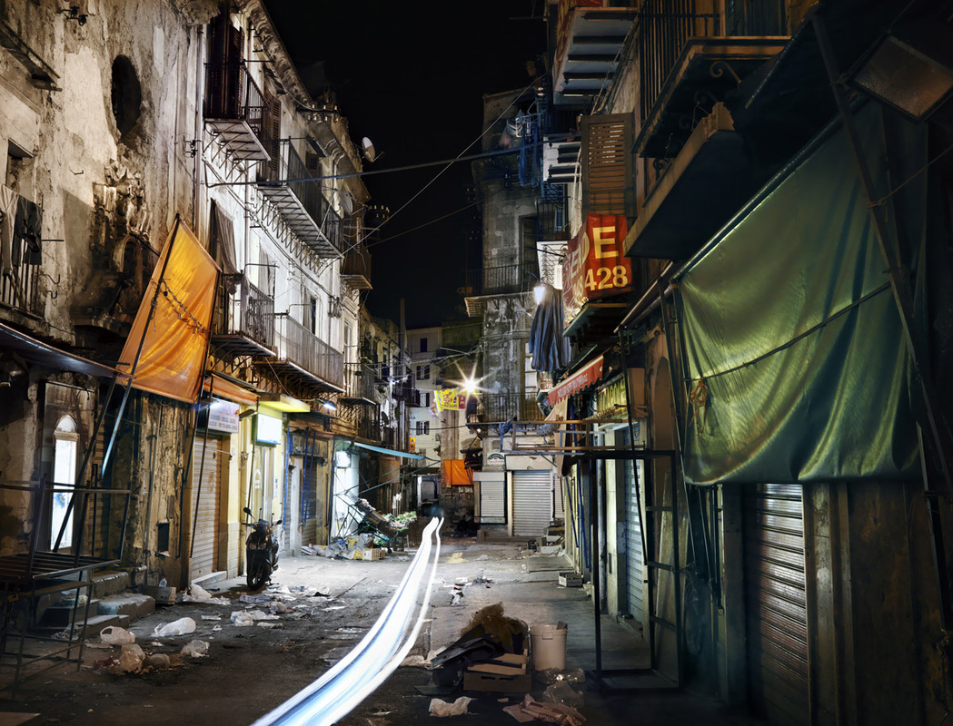 Night alleyway scene with flowing lights